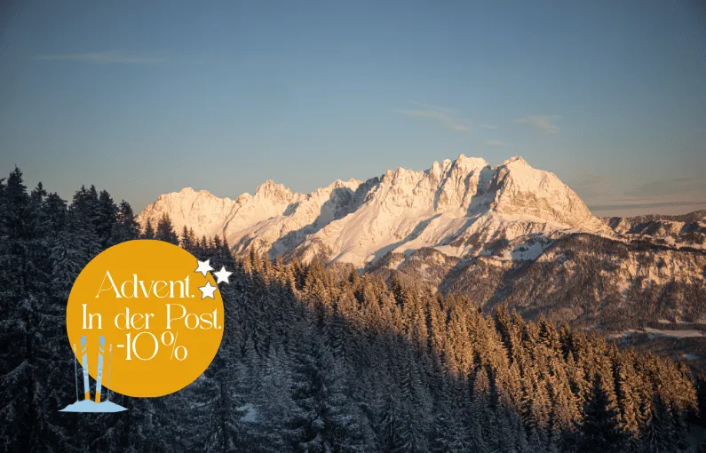 Berglandschaft im Winter mit Advents-Kreation.